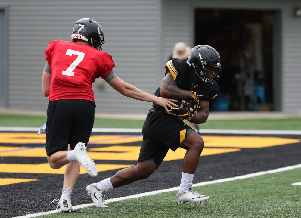 Iowa Hawkeyes quarterback Spencer Petras (7) and running back Mekhi Sargent during practice No. 4 of Fall Camp Monday, August 6, 2018 at the Hansen Football Performance Center. (Brian Ray/hawkeyesports.com)