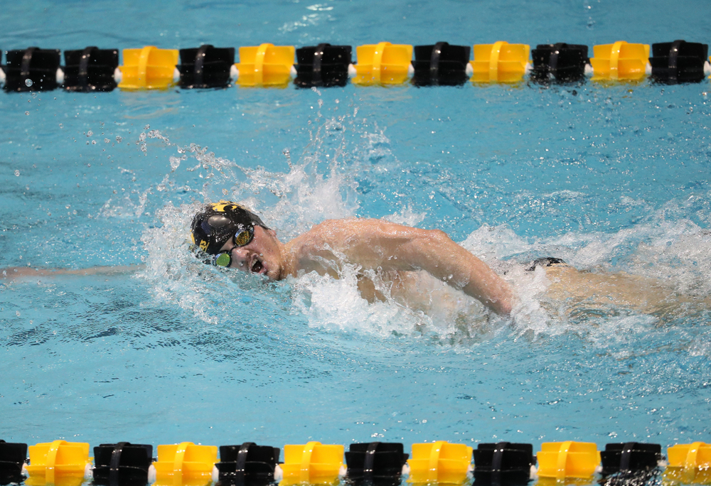 Iowa's Tom Schab swims the 1000 yard freestyle during a double dual against Wisconsin and Northwestern Saturday, January 19, 2019 at the Campus Recreation and Wellness Center. (Brian Ray/hawkeyesports.com)