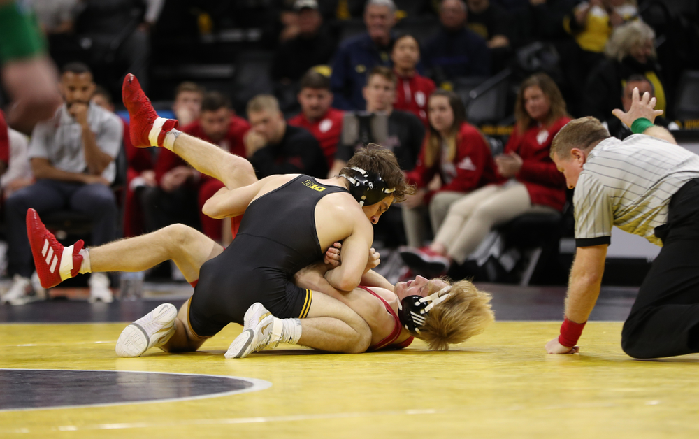 Iowa's Austin DeSanto wrestles Indiana's Paul Konrath at 133 pounds Friday, February 15, 2019 at Carver-Hawkeye Arena. (Brian Ray/hawkeyesports.com)