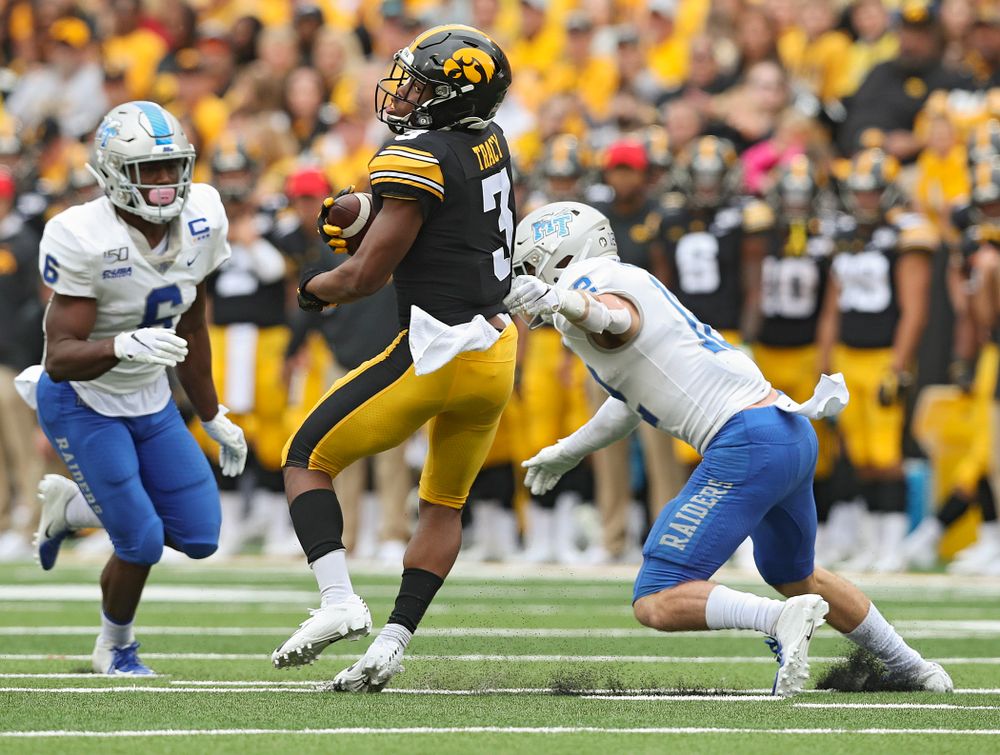 Iowa Hawkeyes wide receiver Tyrone Tracy Jr. (3) spins away from a defender after pulling in a pass during third quarter of their game at Kinnick Stadium in Iowa City on Saturday, Sep 28, 2019. (Stephen Mally/hawkeyesports.com)