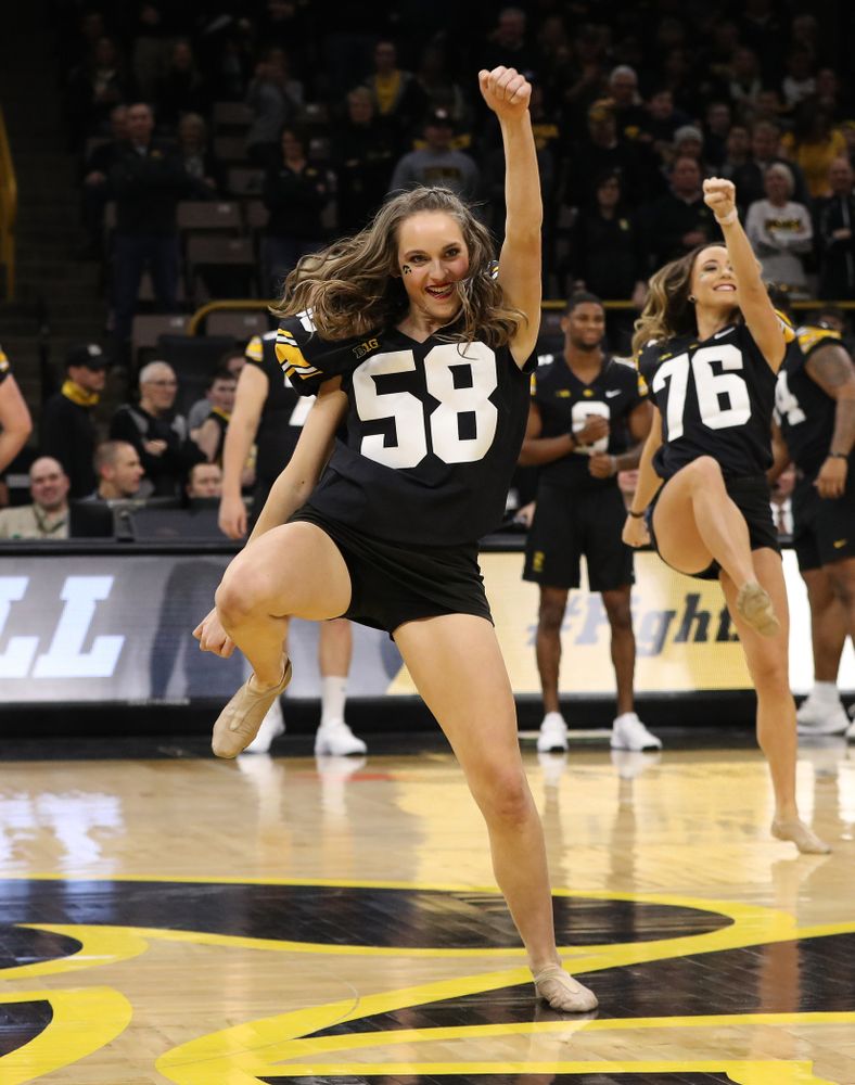 The Iowa Dance Team performs with the Iowa Football Team at halftime of the Iowa Hawkeyes game against the Indiana Hoosiers Friday, February 22, 2019 at Carver-Hawkeye Arena. (Brian Ray/hawkeyesports.com)