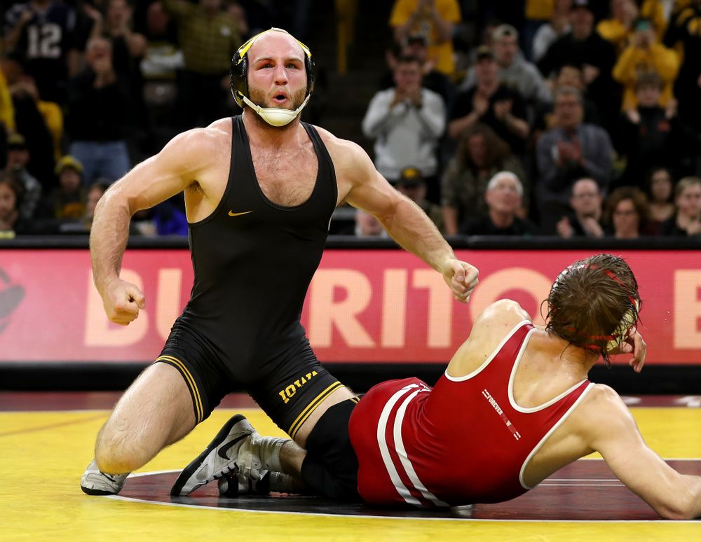 IowaÕs Alex Marinelli wrestles WisconsinÕs Evan Wick at 165 pounds Sunday, December 1, 2019 at Carver-Hawkeye Arena. Marinelli won the match 4-2. (Brian Ray/hawkeyesports.com)
