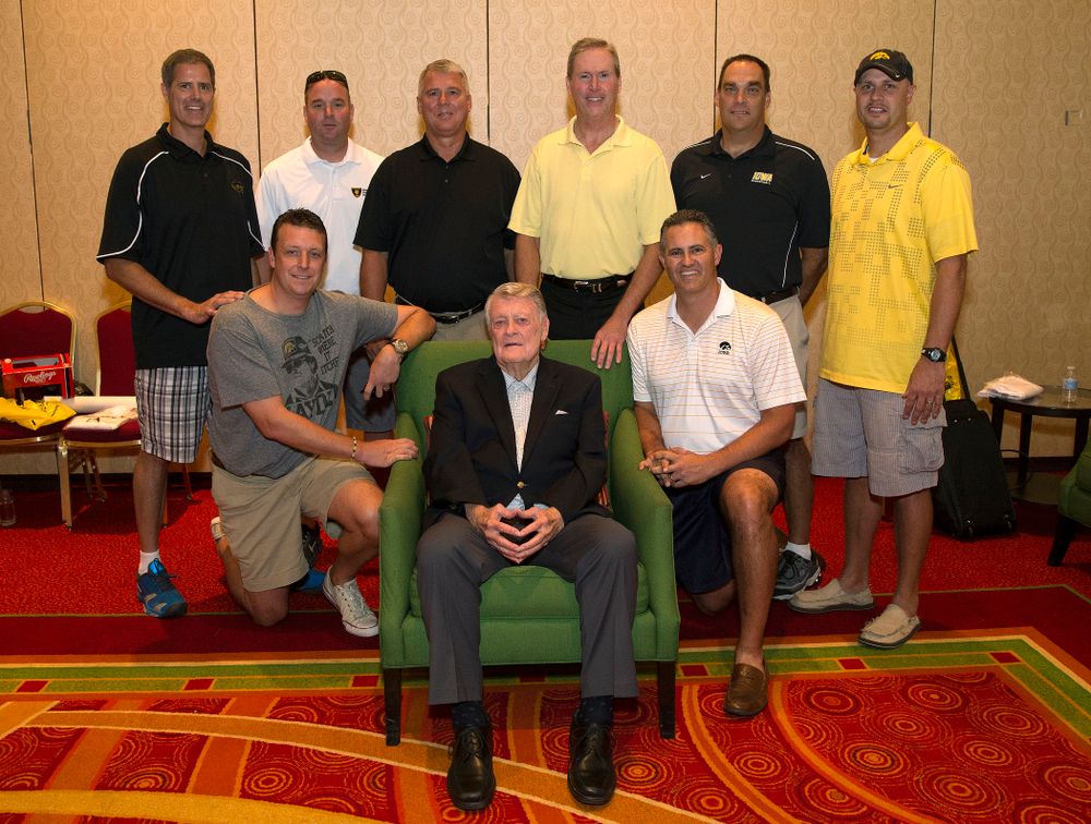 Former Hawkeye Football Head Coach Hayden Fry poses with some of his former quarterbacks before a panel discussion during Fry Fest Friday, Aug. 29, 2014 in Coralville. (Brian Ray/hawkeyesports.com)