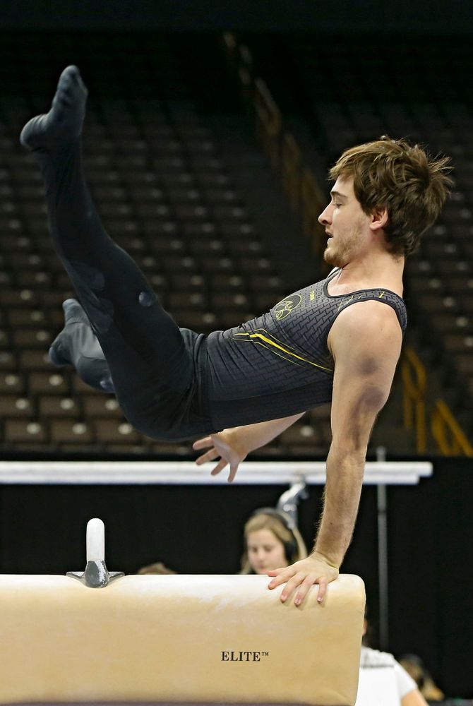 Iowa's Kevin Johnson competes in the pommel horse against Ohio State at Caver-Hawkeye Arena in Iowa City on Saturday, Mar. 16, 2019. (Stephen Mally for HawkeyeSports.com)