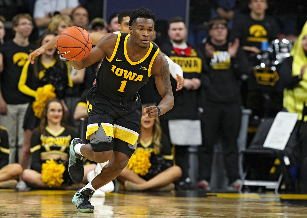Iowa Hawkeyes guard Joe Toussaint (1) brings the ball down the court during the second half of their game at Carver-Hawkeye Arena in Iowa City on Monday, January 27, 2020. (Stephen Mally/hawkeyesports.com)
