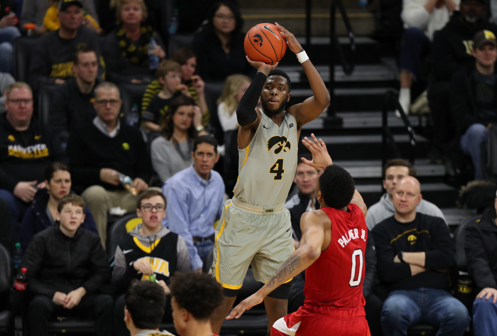Iowa Hawkeyes guard Isaiah Moss (4) knocks down a three point basket against the Nebraska Cornhuskers Sunday, January 6, 2019 at Carver-Hawkeye Arena. (Brian Ray/hawkeyesports.com)