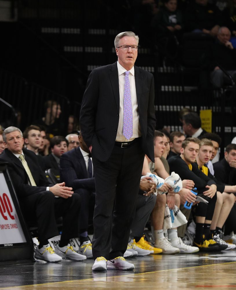 Iowa Hawkeyes head coach Fran McCaffery wears sneakers with his suit in support of cancer research against the Michigan State Spartans Thursday, January 24, 2019 at Carver-Hawkeye Arena. (Brian Ray/hawkeyesports.com)