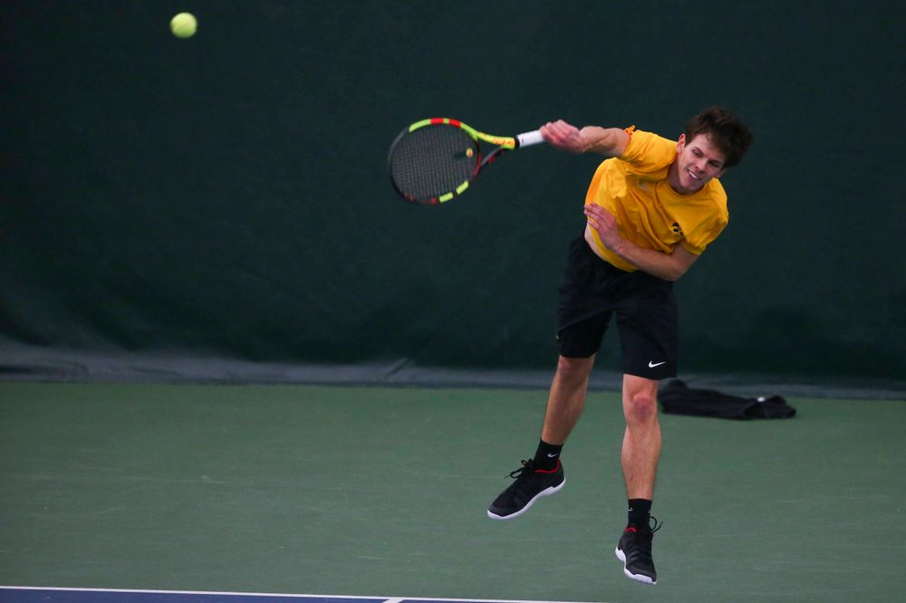 Iowa's Joe Tyler at a tennis match vs Drake Friday, March 8, 2019 at the Hawkeye Tennis and Recreation Complex. (Lily Smith/hawkeyesports.com)