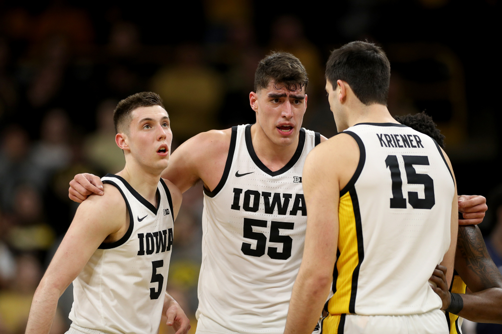 Iowa Hawkeyes guard CJ Fredrick (5), forward Luka Garza (55), and forward Ryan Kriener (15) against Penn State Saturday, February 29, 2020 at Carver-Hawkeye Arena. (Brian Ray/hawkeyesports.com)