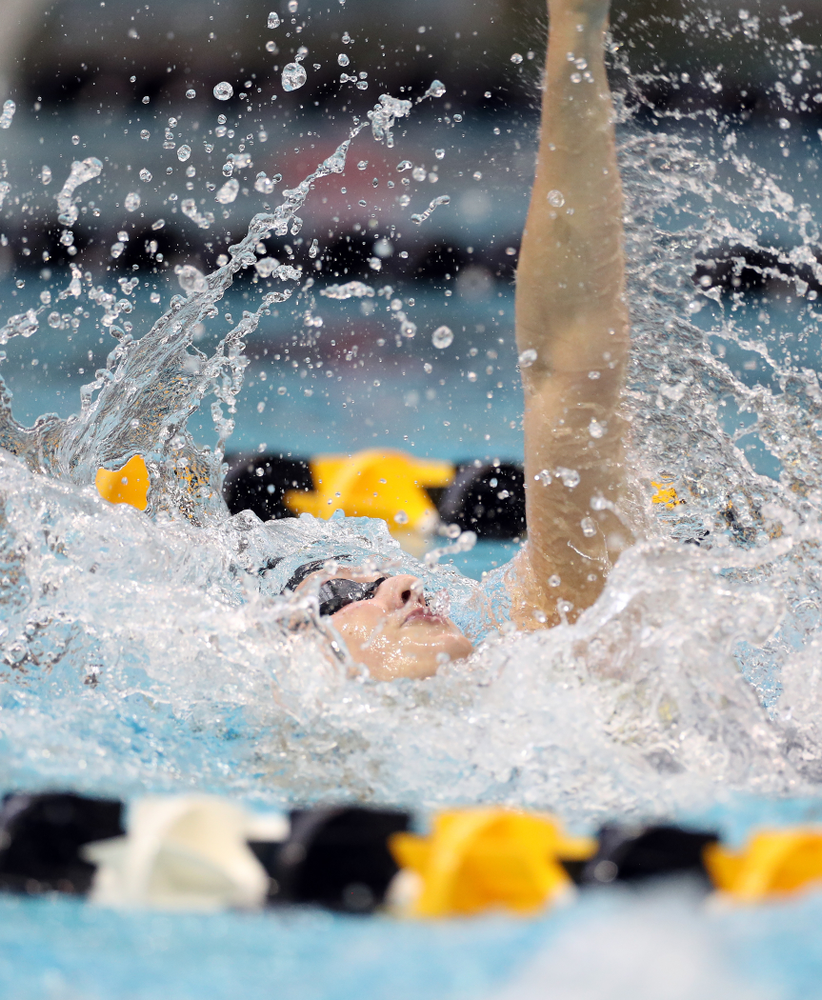 IowaÕs Emily Sansome swims the 100 yard backstroke against the Michigan Wolverines Friday, November 1, 2019 at the Campus Recreation and Wellness Center. (Brian Ray/hawkeyesports.com)