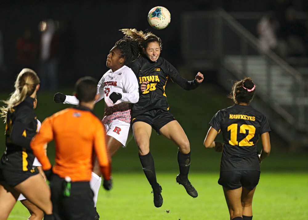 Iowa midfielder Josie Durr (25) battles for a header during the second half of their match at the Iowa Soccer Complex in Iowa City on Friday, Oct 11, 2019. (Stephen Mally/hawkeyesports.com)