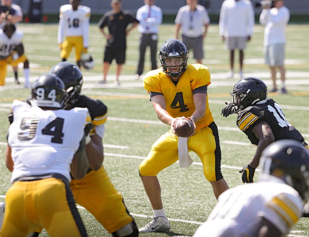 Iowa Hawkeyes quarterback Nate Stanley (4) prepares to hand off to running back Mekhi Sargent (10) during Fall Camp Practice #5 at the Hansen Football Performance Center in Iowa City on Tuesday, Aug 6, 2019. (Stephen Mally/hawkeyesports.com)