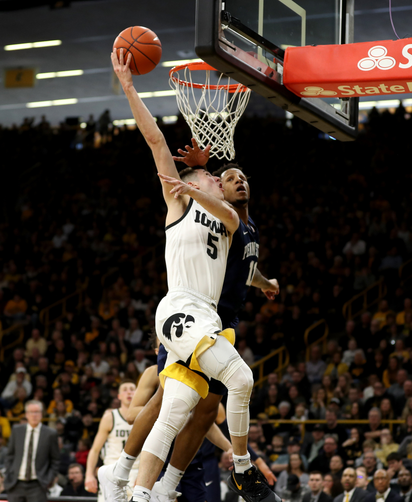 Iowa Hawkeyes guard CJ Fredrick (5) goes to the hoop against Penn State Saturday, February 29, 2020 at Carver-Hawkeye Arena. (Brian Ray/hawkeyesports.com)