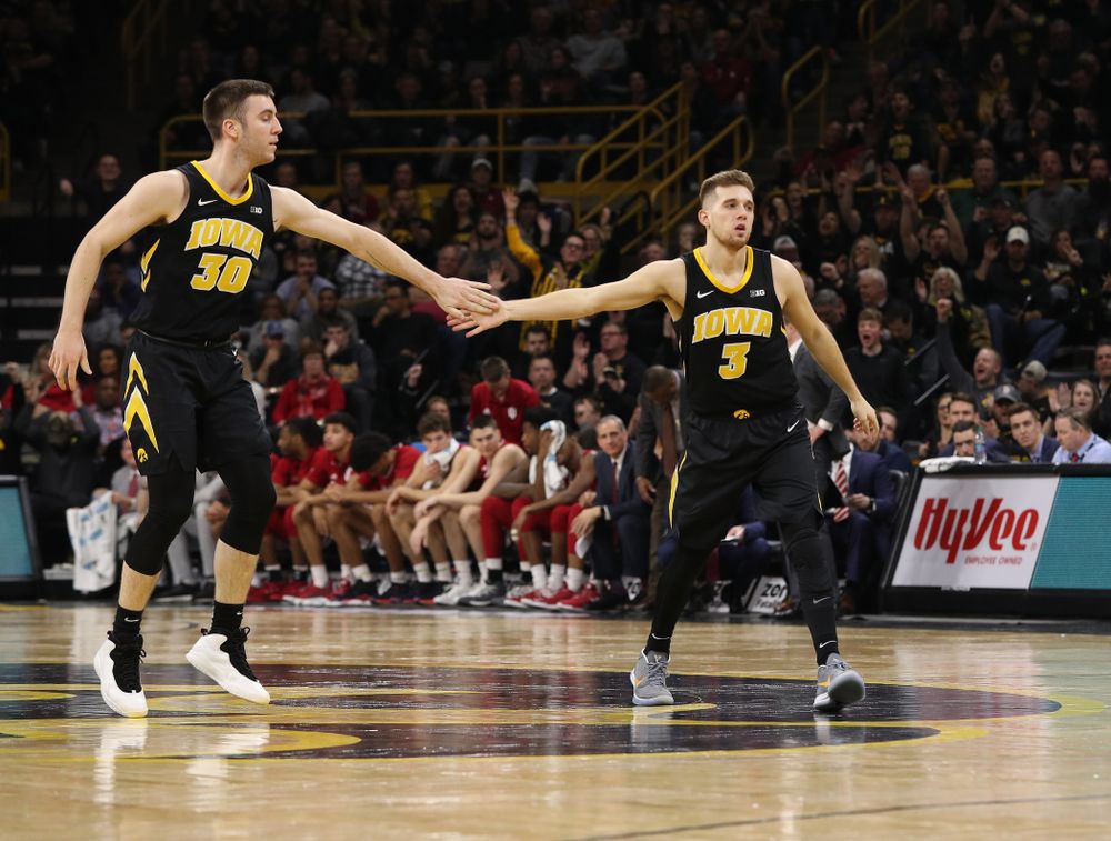 Iowa Hawkeyes guard Jordan Bohannon (3) and guard Connor McCaffery (30) against the Indiana Hoosiers Friday, February 22, 2019 at Carver-Hawkeye Arena. (Brian Ray/hawkeyesports.com)