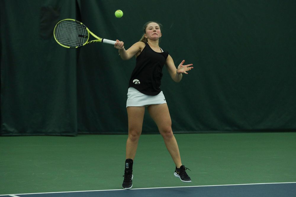 Iowa’s Danielle Burich returns a hit during the Iowa women’s tennis meet vs DePaul on Friday, February 21, 2020 at the Hawkeye Tennis and Recreation Complex. (Lily Smith/hawkeyesports.com)