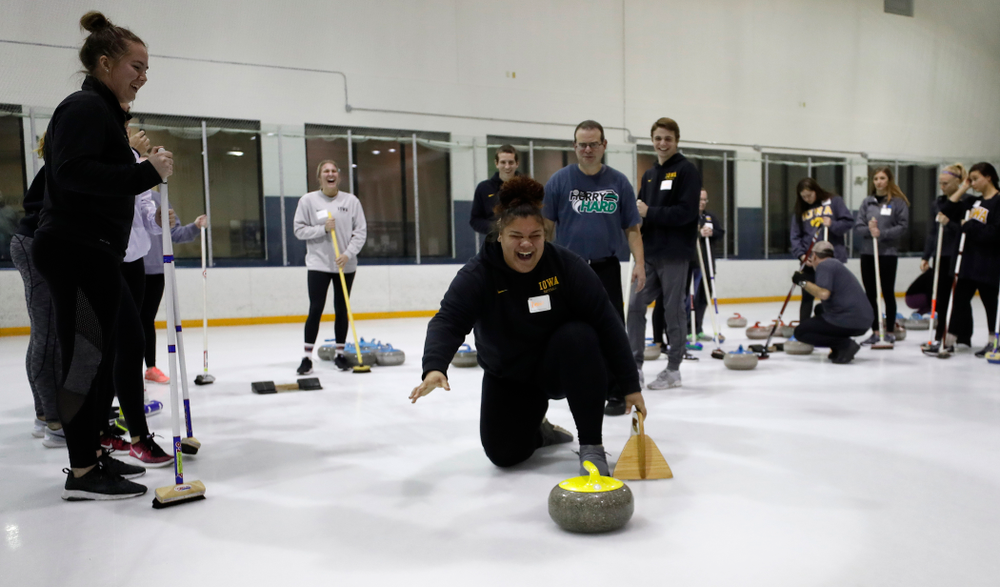 Members of the Iowa Softball team learn the sport of curling as part of a team building event Wednesday, January 10, 2018 at the Cedar Rapids Ice Arena. (Brian Ray/hawkeyesports.com)