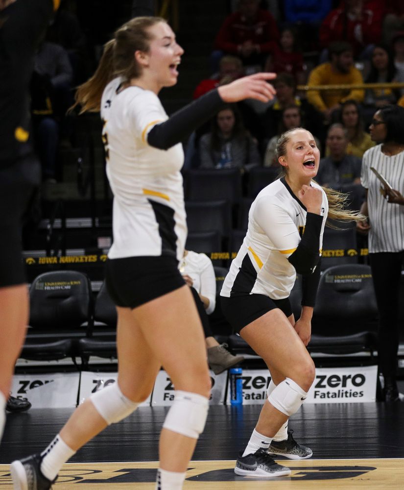 Iowa Hawkeyes defensive specialist Maddie Slagle (15) celebrates after winning a point during a match against Nebraska at Carver-Hawkeye Arena on November 7, 2018. (Tork Mason/hawkeyesports.com)
