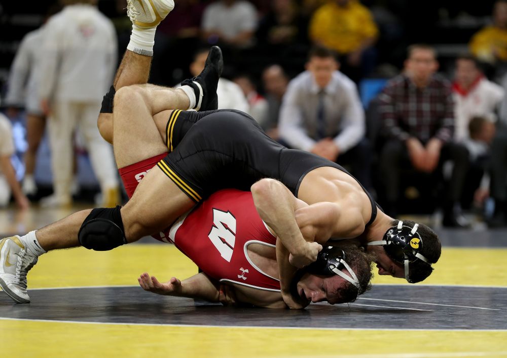 IowaÕs Michael Kemerer wrestles WisconsinÕs Jared Krattinger at 174 pounds Sunday, December 1, 2019 at Carver-Hawkeye Arena. Kemerer won the match with a fall. (Brian Ray/hawkeyesports.com)