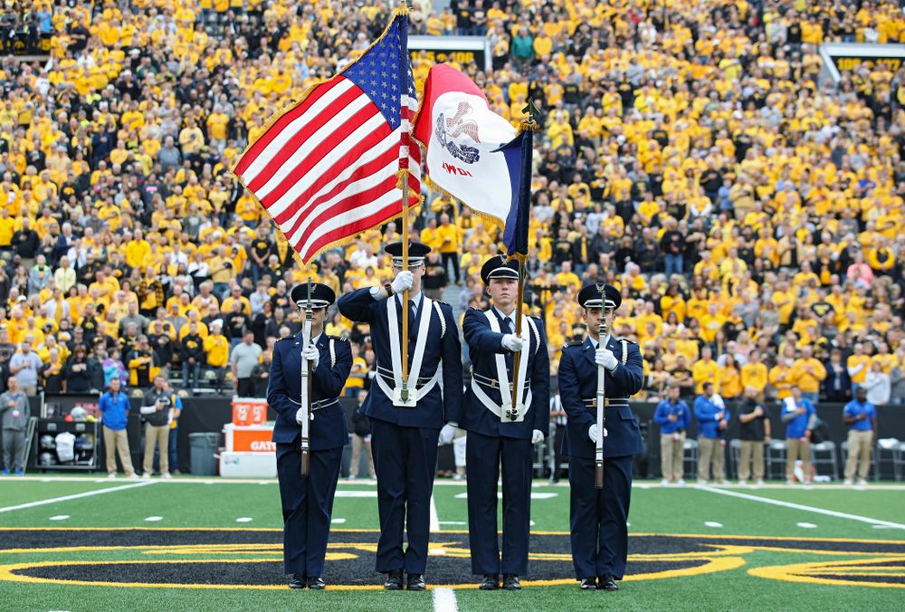 The color guard presents the flags for the National Anthem
before their game at Kinnick Stadium in Iowa City on Saturday, Sep 28, 2019. (Stephen Mally/hawkeyesports.com)