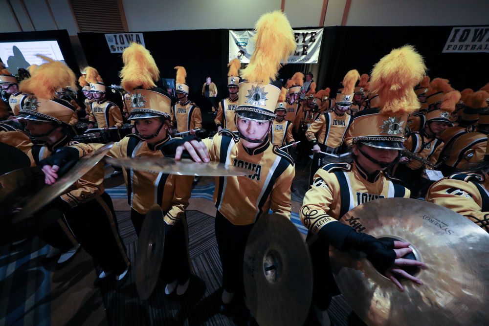 The Hawkeye Marching Band and the Iowa Spirit Squads perform during the Holiday Bowl Hawkeye Huddle Thursday, December 26, 2019 at the Hilton in downtown San Diego. (Brian Ray/hawkeyesports.com)