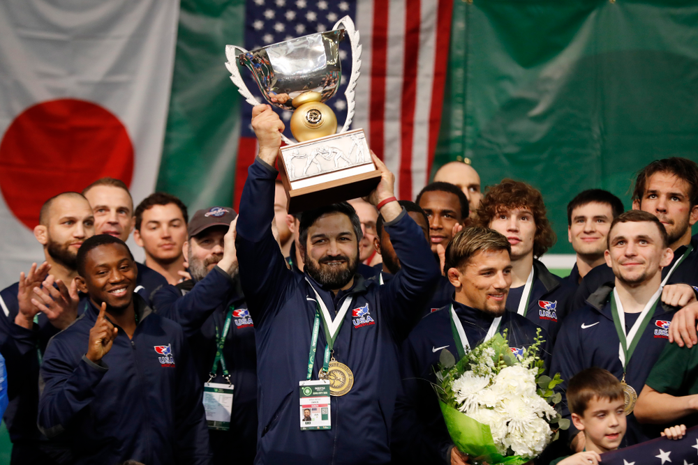 Head Coach Bill Zadick holds up the trophy following the gold medal match of the United World Wrestling Freestyle World Cup against Azerbaijan Sunday, April 8, 2018 at Carver-Hawkeye Arena. (Brian Ray/hawkeyesports.com)