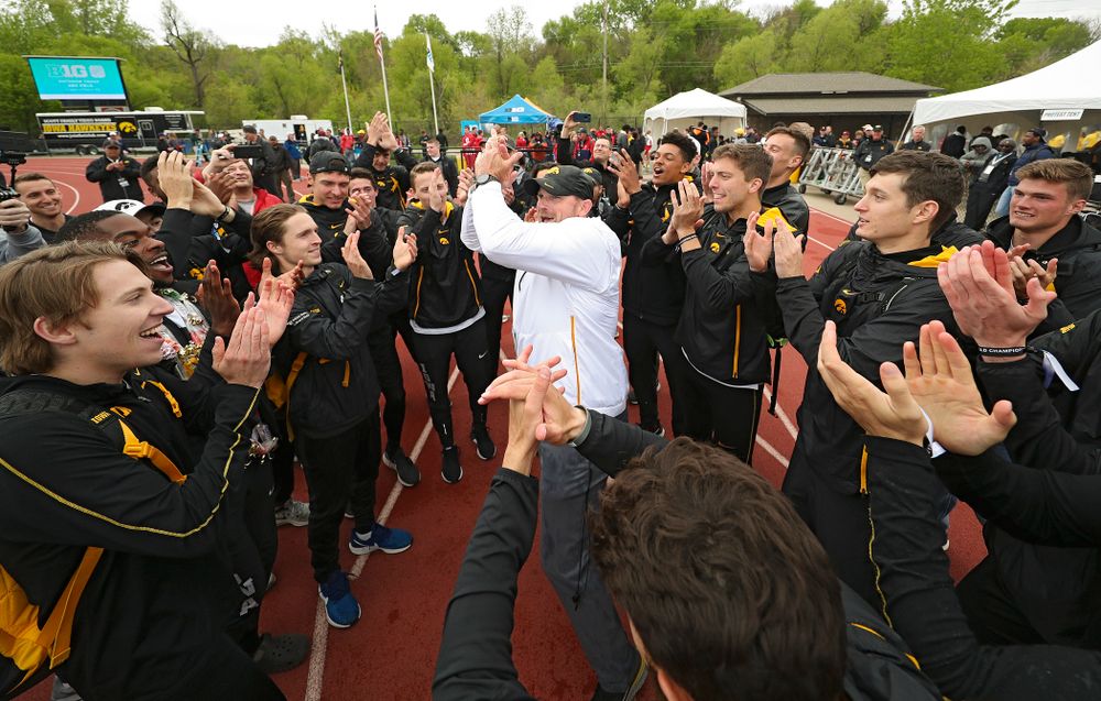 Iowa Director of Track and Field Joey Woody celebrates with his team after winning the Men's Big Ten Outdoor Track and Field Championships on the third day of the Big Ten Outdoor Track and Field Championships at Francis X. Cretzmeyer Track in Iowa City on Sunday, May. 12, 2019. (Stephen Mally/hawkeyesports.com)