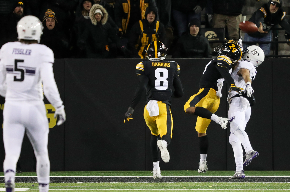 Iowa Hawkeyes defensive back Amani Hooker (27) breaks up a pass during a game against Northwestern at Kinnick Stadium on November 10, 2018. (Tork Mason/hawkeyesports.com)