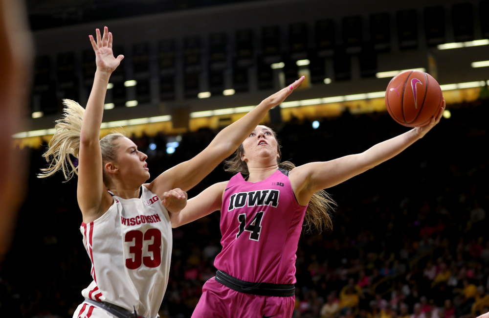 Iowa Hawkeyes forward McKenna Warnock (14) against the Wisconsin Badgers Sunday, February 16, 2020 at Carver-Hawkeye Arena. (Brian Ray/hawkeyesports.com)