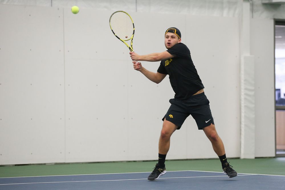 Iowa’s Will Davies returns a hit during the Iowa men’s tennis meet vs VCU on Saturday, February 29, 2020 at the Hawkeye Tennis and Recreation Complex. (Lily Smith/hawkeyesports.com)