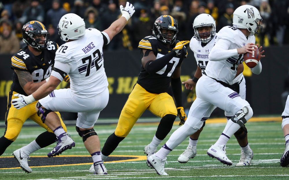 Iowa Hawkeyes defensive end Chauncey Golston (57) rushes the quarterback during a game against Northwestern at Kinnick Stadium on November 10, 2018. (Tork Mason/hawkeyesports.com)