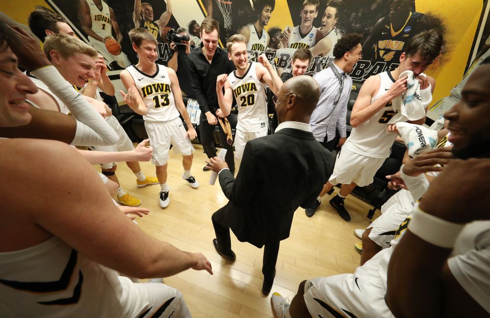 Iowa Hawkeyes assistant coach Sherman Dillard dances in the locker room following their victory over the Michigan Wolverines Friday, February 1, 2019 at Carver-Hawkeye Arena. (Brian Ray/hawkeyesports.com)