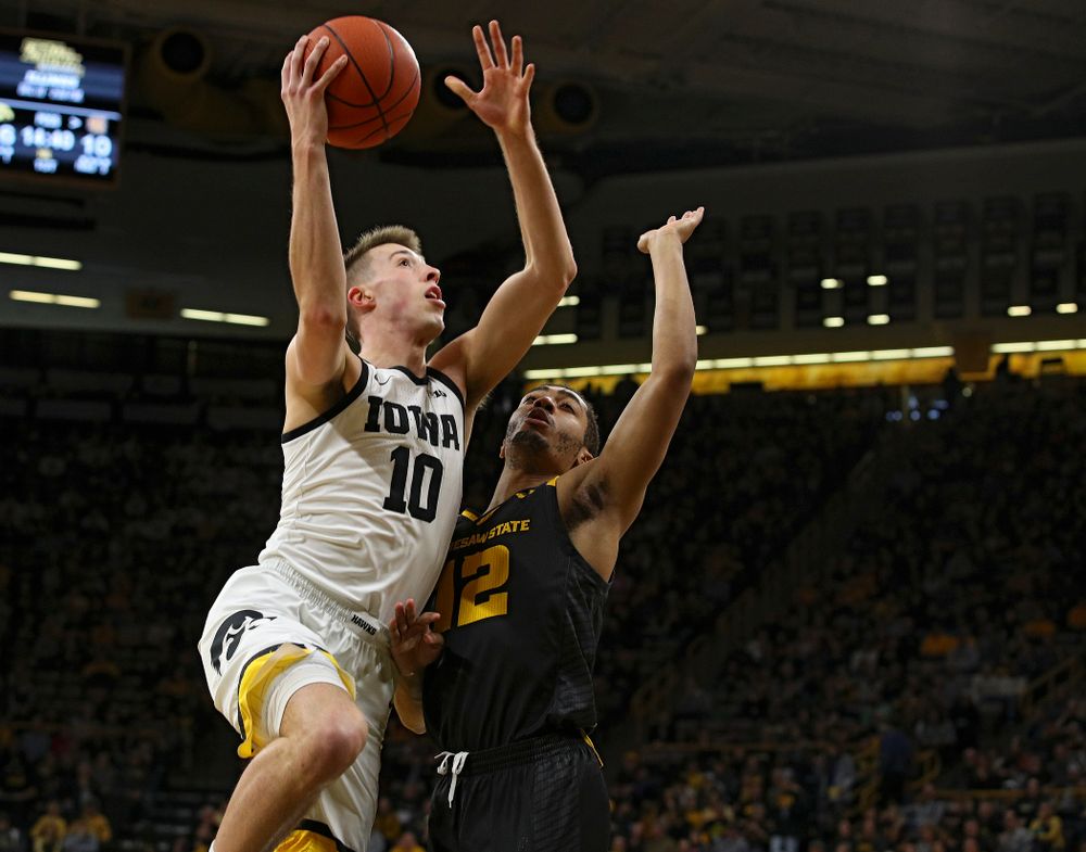 Iowa Hawkeyes guard Joe Wieskamp (10) scores a basket during the first half of their their game at Carver-Hawkeye Arena in Iowa City on Sunday, December 29, 2019. (Stephen Mally/hawkeyesports.com)