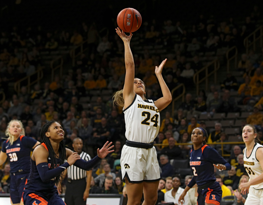 Iowa Hawkeyes guard Gabbie Marshall (24) score a basket during the fourth quarter of their game at Carver-Hawkeye Arena in Iowa City on Tuesday, December 31, 2019. (Stephen Mally/hawkeyesports.com)