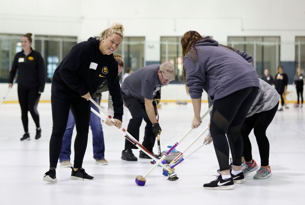 Members of the Iowa Softball team learn the sport of curling as part of a team building event Wednesday, January 10, 2018 at the Cedar Rapids Ice Arena. (Brian Ray/hawkeyesports.com)