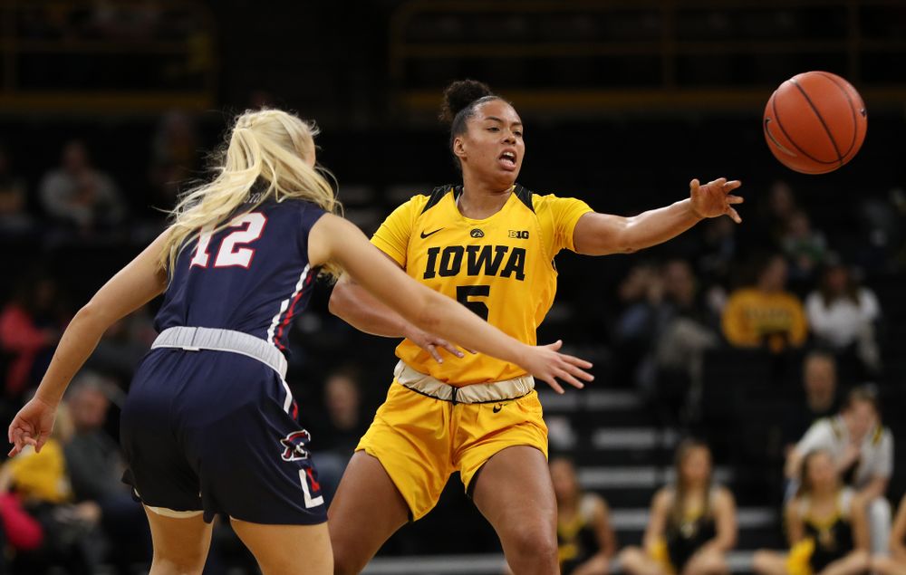 Iowa Hawkeyes guard Alexis Sevillian (5) against the Robert Morris Colonials Sunday, December 2, 2018 at Carver-Hawkeye Arena. (Brian Ray/hawkeyesports.com)