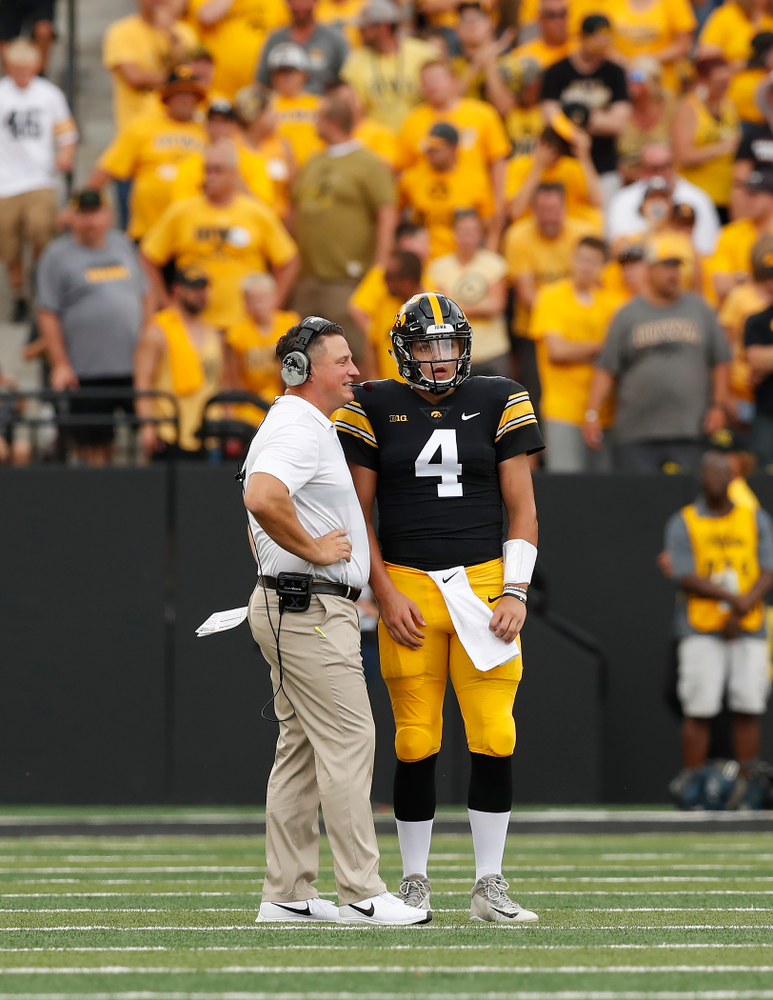 Iowa Hawkeyes quarterback Nate Stanley (4) and offensive coordinator Brian Ferentz against the Northern Illinois Huskies Saturday, September 1, 2018 at Kinnick Stadium. (Brian Ray/hawkeyesports.com)