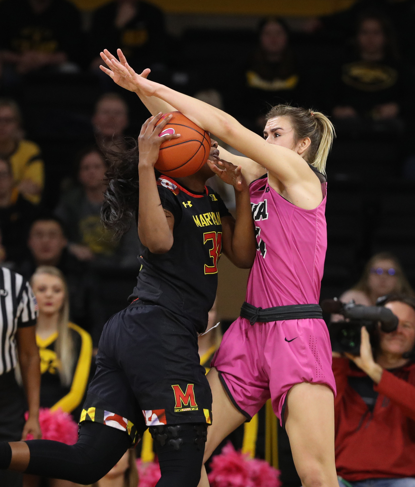 Iowa Hawkeyes forward Hannah Stewart (21) blocks a shot against the seventh ranked Maryland Terrapins Sunday, February 17, 2019 at Carver-Hawkeye Arena. (Brian Ray/hawkeyesports.com)