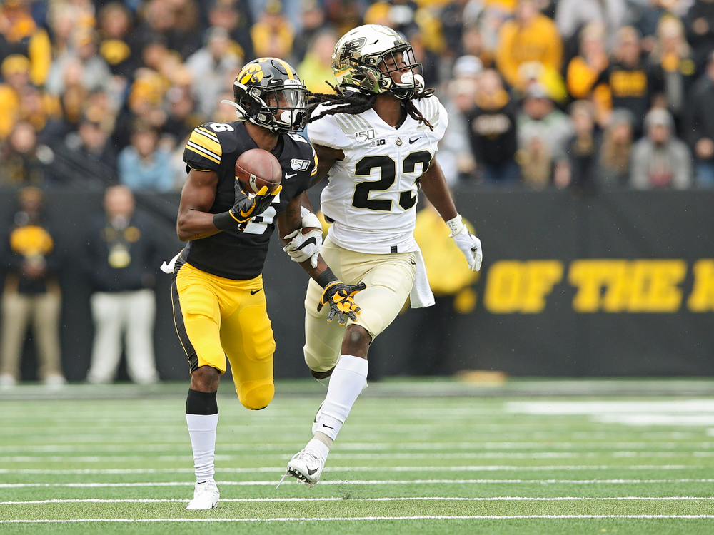 Iowa Hawkeyes wide receiver Ihmir Smith-Marsette (6) pulls in a pass with one hand during the first quarter of their game at Kinnick Stadium in Iowa City on Saturday, Oct 19, 2019. (Stephen Mally/hawkeyesports.com)
