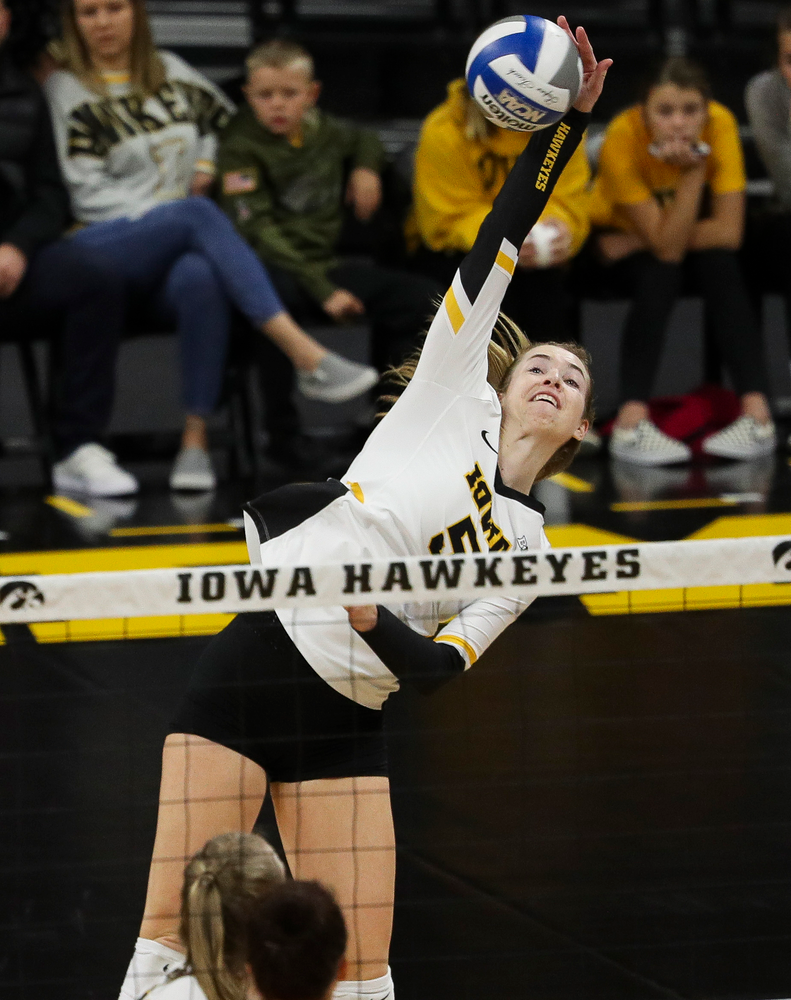 Iowa Hawkeyes outside hitter Meghan Buzzerio (5) spikes the ball during a match against Maryland at Carver-Hawkeye Arena on November 23, 2018. (Tork Mason/hawkeyesports.com)