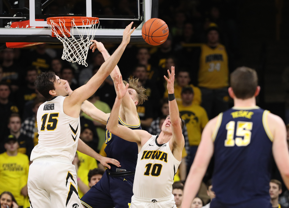 Iowa Hawkeyes forward Ryan Kriener (15) and guard Joe Wieskamp (10) against the Michigan Wolverines Friday, February 1, 2019 at Carver-Hawkeye Arena. (Brian Ray/hawkeyesports.com)