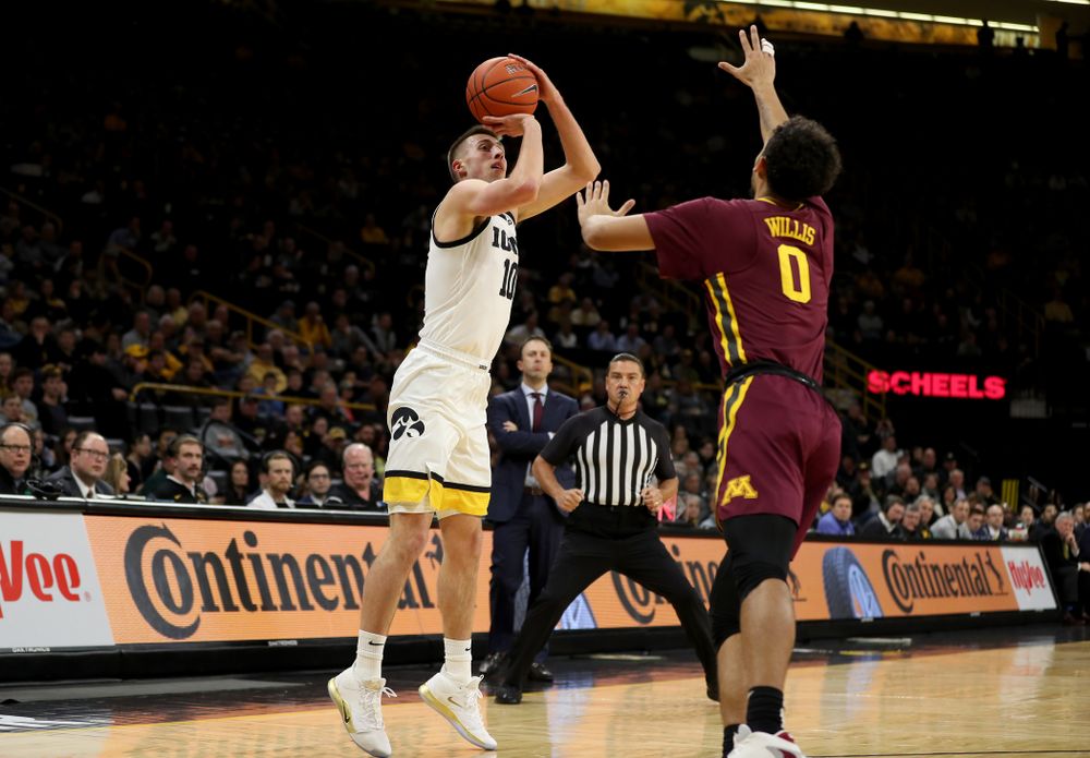 Iowa Hawkeyes guard Joe Wieskamp (10) pulls up for a three point basket against the Minnesota Golden Gophers Monday, December 9, 2019 at Carver-Hawkeye Arena. (Brian Ray/hawkeyesports.com)