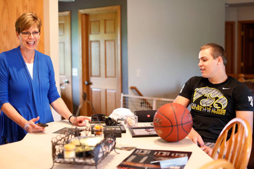Iowa Hawkeyes quarterback Nathan Stanley (4) talks about some of his childhood memories with his mother Donita Wednesday, May 30, 2018 in Menomonie, Wisc. (Brian Ray/hawkeyesports.com)