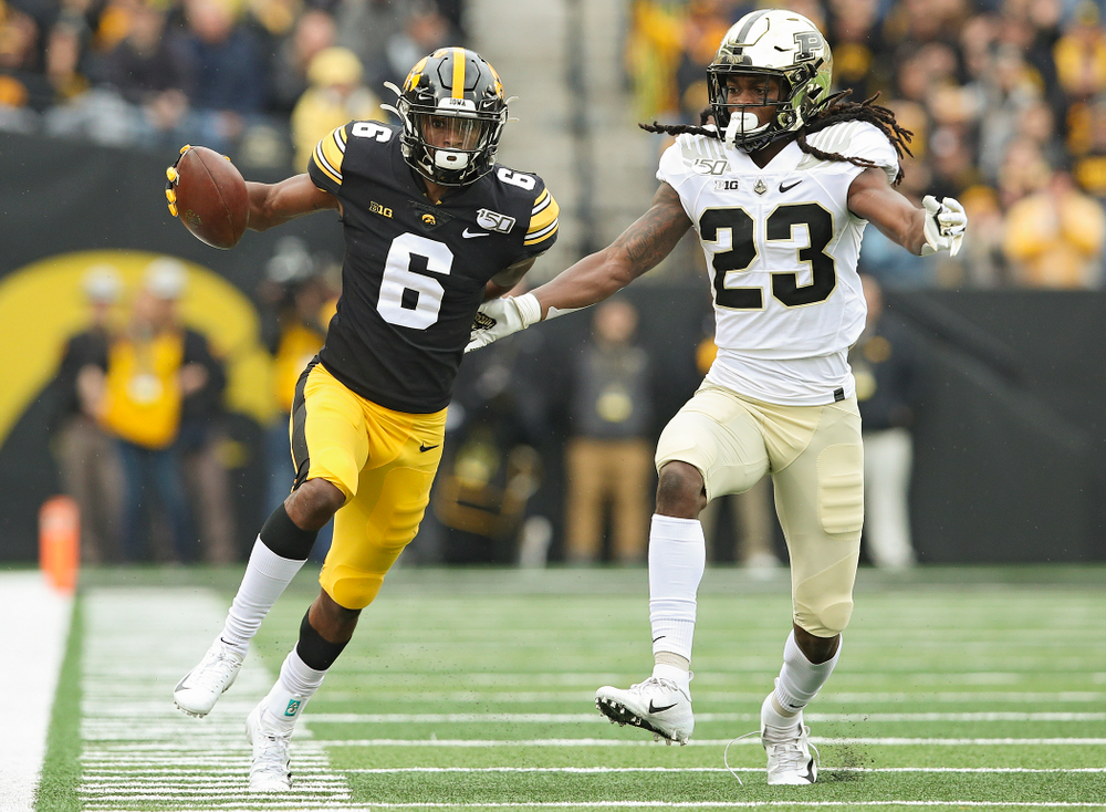 Iowa Hawkeyes wide receiver Ihmir Smith-Marsette (6) runs after pulling in a pass with one hand during the first quarter of their game at Kinnick Stadium in Iowa City on Saturday, Oct 19, 2019. (Stephen Mally/hawkeyesports.com)