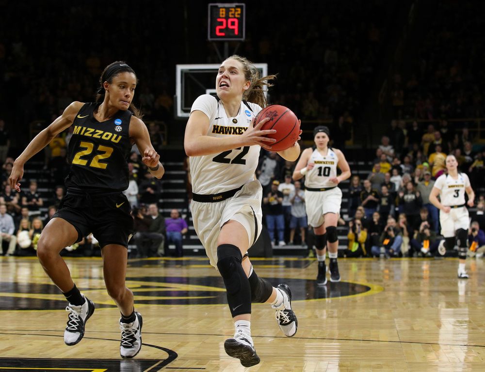 Iowa Hawkeyes guard Kathleen Doyle (22) drives in to the basket after a steal during the fourth quarter of their second round game in the 2019 NCAA Women's Basketball Tournament at Carver Hawkeye Arena in Iowa City on Sunday, Mar. 24, 2019. (Stephen Mally for hawkeyesports.com)