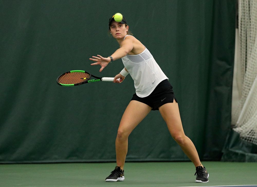 Iowa’s Elise Van Heuvelen returns a shot during her singles match at the Hawkeye Tennis and Recreation Complex in Iowa City on Sunday, February 23, 2020. (Stephen Mally/hawkeyesports.com)