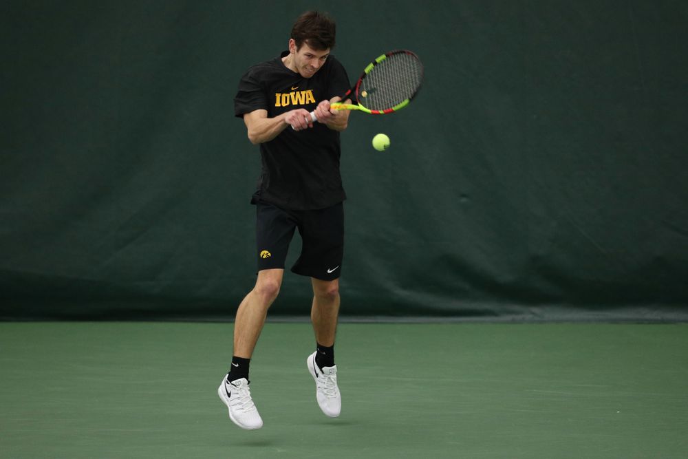Iowa's Piotr Smietana against UMKC Friday, February 15, 2019 at the Hawkeye Tennis and Recreation Complex. (Brian Ray/hawkeyesports.com)