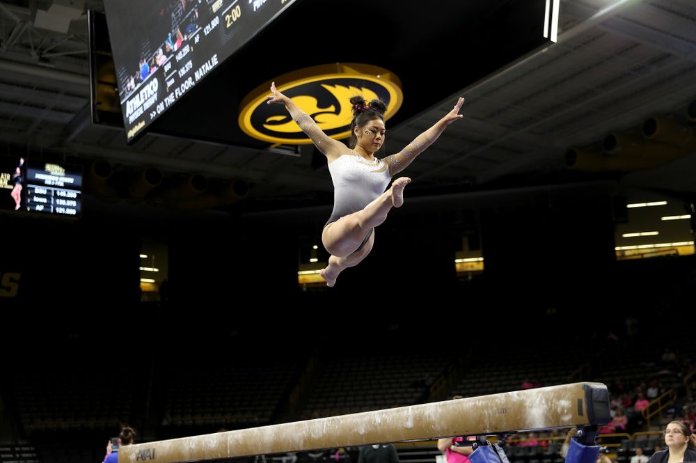 IowaÕs Clair Kaji competes on the beam against Ball State and Air Force Saturday, January 11, 2020 at Carver-Hawkeye Arena. (Brian Ray/hawkeyesports.com)