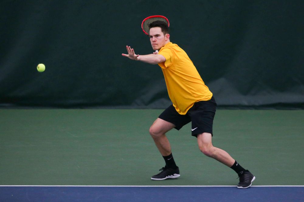 Iowa's Jonas Larsen at a tennis match vs Drake Friday, March 8, 2019 at the Hawkeye Tennis and Recreation Complex. (Lily Smith/hawkeyesports.com)