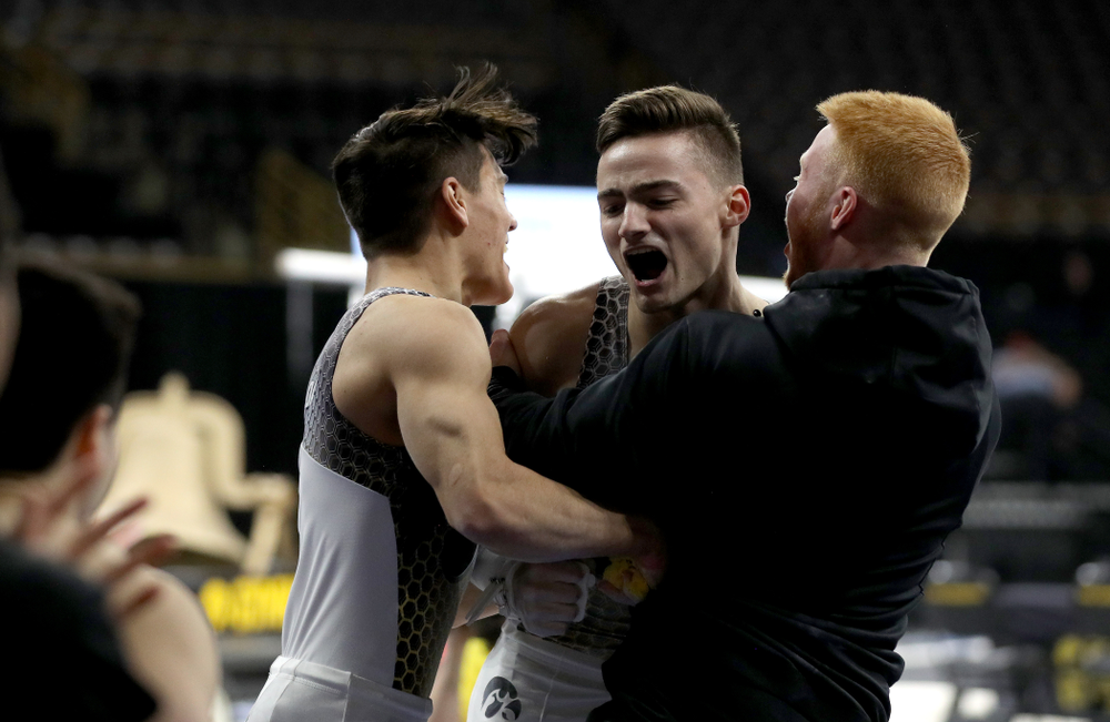 Iowa’s Mitch Mandozzi competes on the high bar against Illinois Sunday, March 1, 2020 at Carver-Hawkeye Arena. (Brian Ray/hawkeyesports.com)