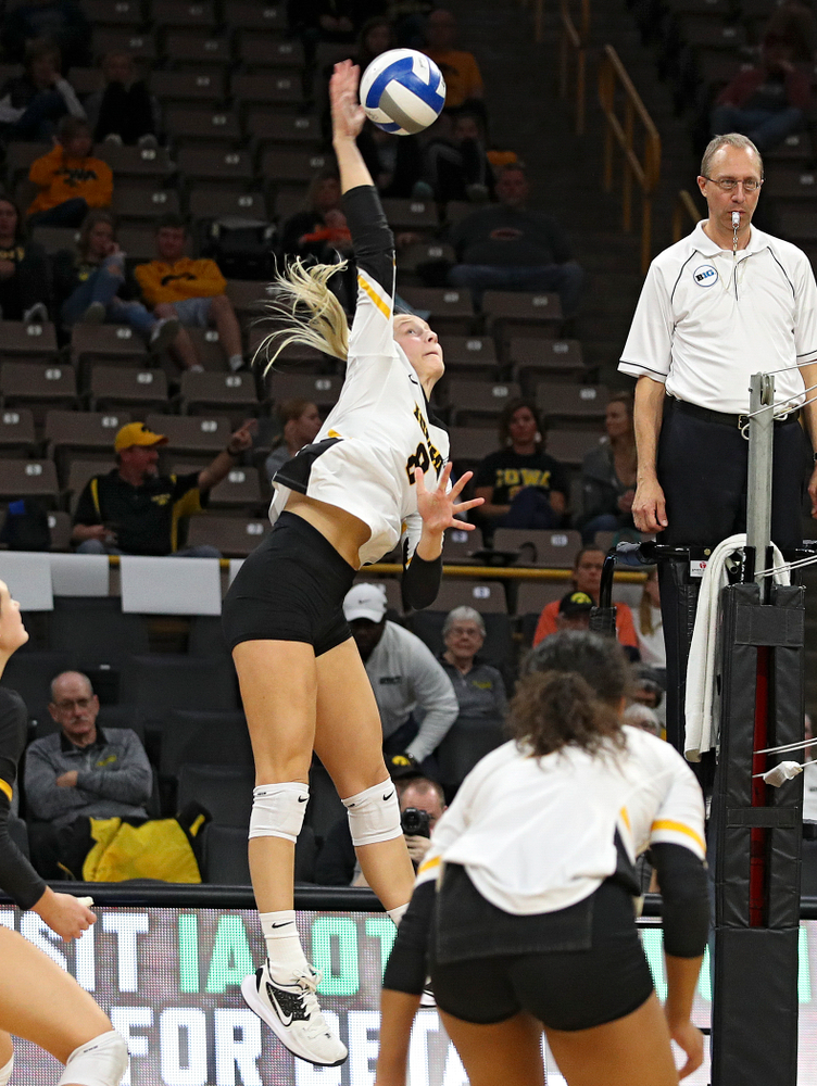 Iowa’s Kyndra Hansen (8) lines up a shot during the third set of their volleyball match at Carver-Hawkeye Arena in Iowa City on Sunday, Oct 13, 2019. (Stephen Mally/hawkeyesports.com)